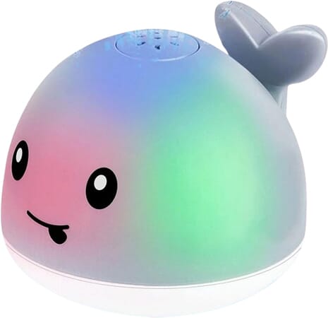 Ballena luminosa con fuente para el baño